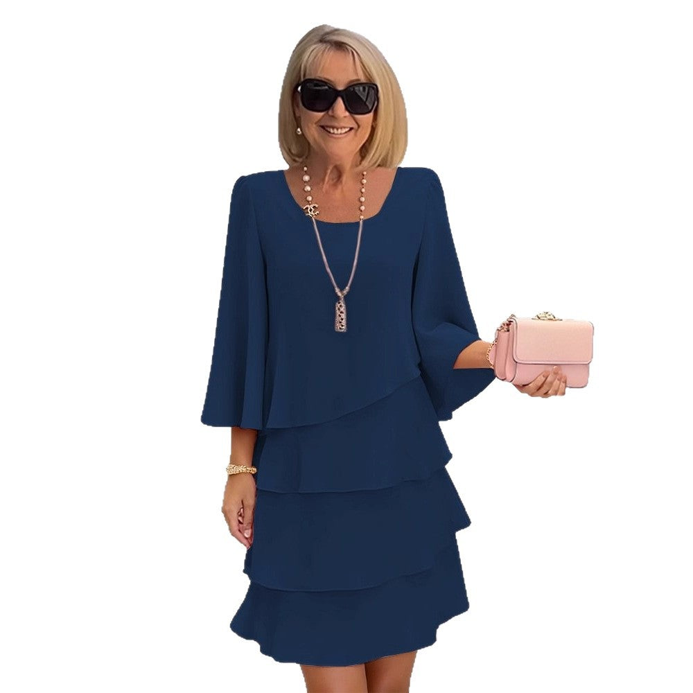 Marga – Vestido midi elegante con volantes