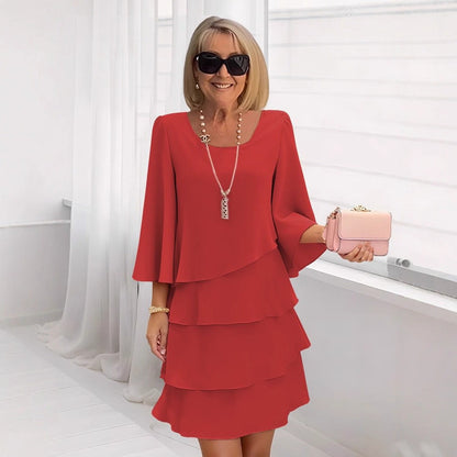 Marga – Vestido midi elegante con volantes