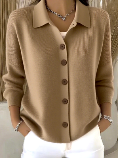 Nora - Blusa de punto beige.