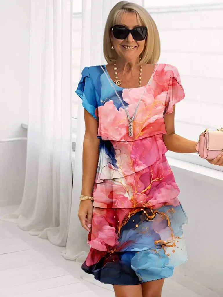Adela – Vestido elegante fluido con volantes