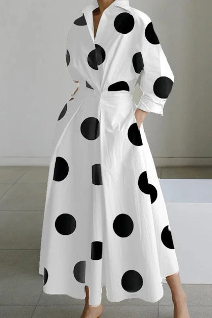 AV | Vestido fluido con escote en V y manga tres cuartos