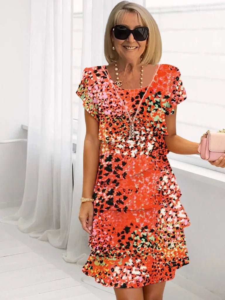 Briana – Vestido elegante fluido con volantes