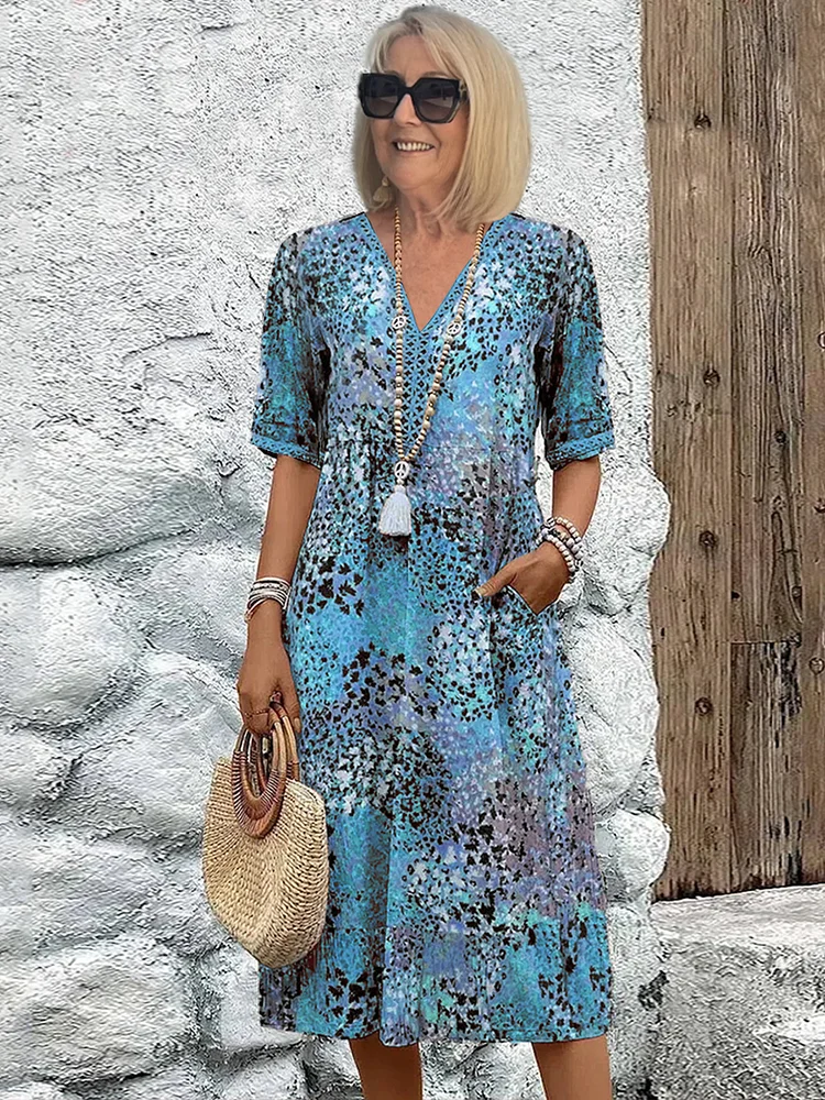 Véronique – Vestido midi fluido elegante
